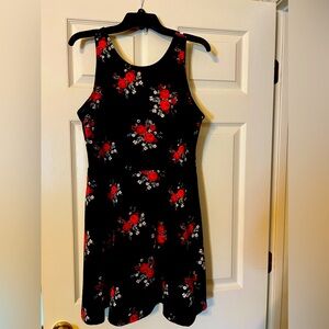 Dress black with red flowers and / green/ white.